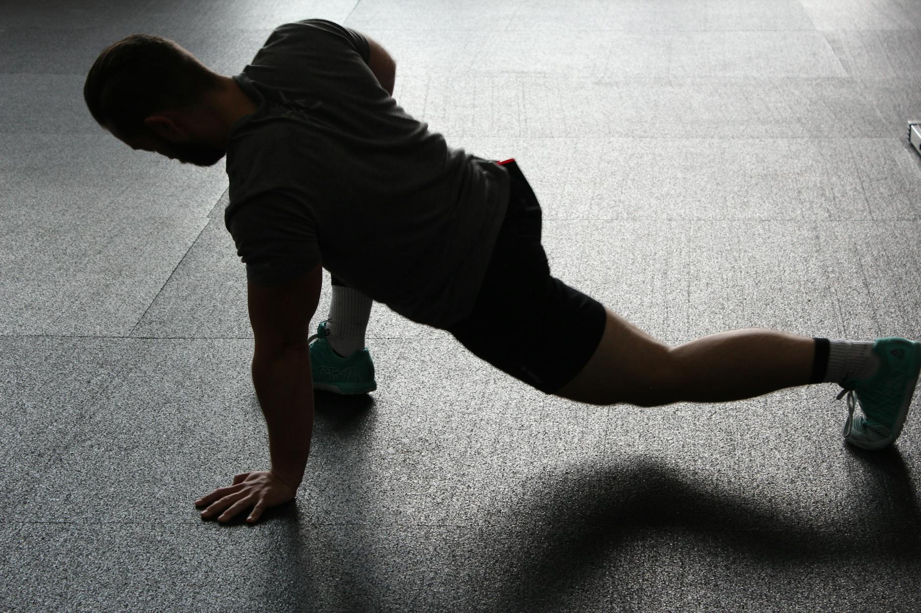 man doing runners lunge stretch to reinforce the thought of regular stretching