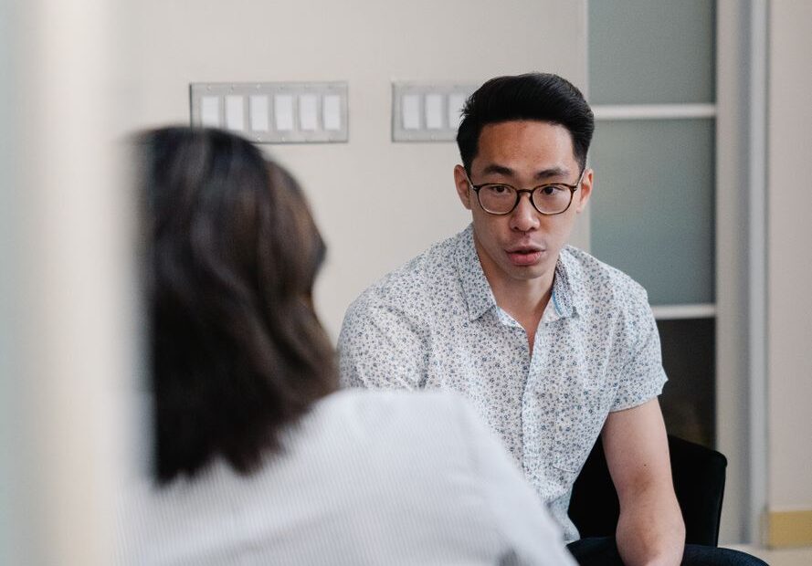 two people having a discussion